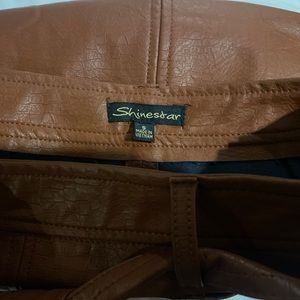 Shinestar leather mini skirt